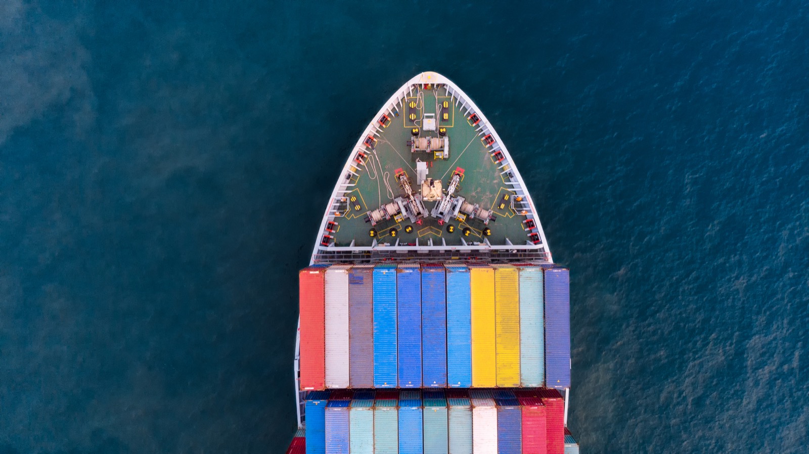 Aerial view of a cargo ship carrying containers